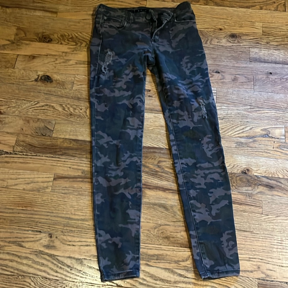 I'm selling green and brown camo jeans made by STSblue